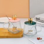 Luxury Golden Crown Glass Mug with Handle & Stainless Steel Spoon – Elegant Tea, Coffee, Chocolate & Juice Drinking Cup - Image 2